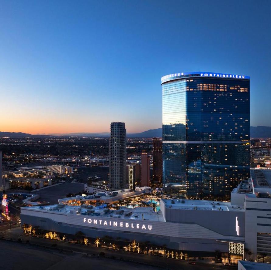 Fontainebleau Las Vegas luxury resort on the Strip featuring LIV Nightclub, LIV Beach dayclub, upscale hotel tower and pool deck at sunset